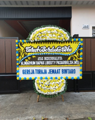 Papan Bunga Duka di Taluk